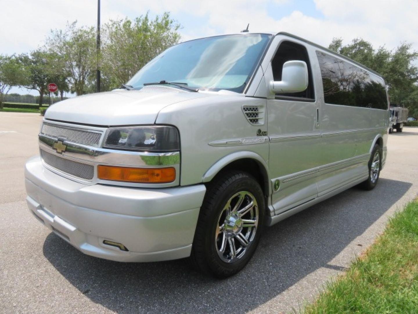 2014 Chevrolet Express (1GBWGLCG3E1) , located at 4301 Oak Circle #19, Boca Raton, FL, 33431, (954) 561-2499, 26.388861, -80.084038 - You are looking at a Rare 2014 Chevy Express 2500 Quigley 4x4 Four Wheel Drive Explorer Limited SE 9 Passenger Conversion Van with: 107K Original Miles, 6 Captain Chairs, Rear Power Folding Bench Seat Bed, Center Consoler Cooler, Front PPF (Paint Protection Film) Explorer Limited Conversion Througho - Photo#12